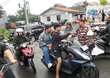 Ramadan Berbagi, LMP Tangsel Bagikan 500 Paket Makanan di Bunderan Meruga Ciputat